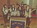 Tris Gour with band